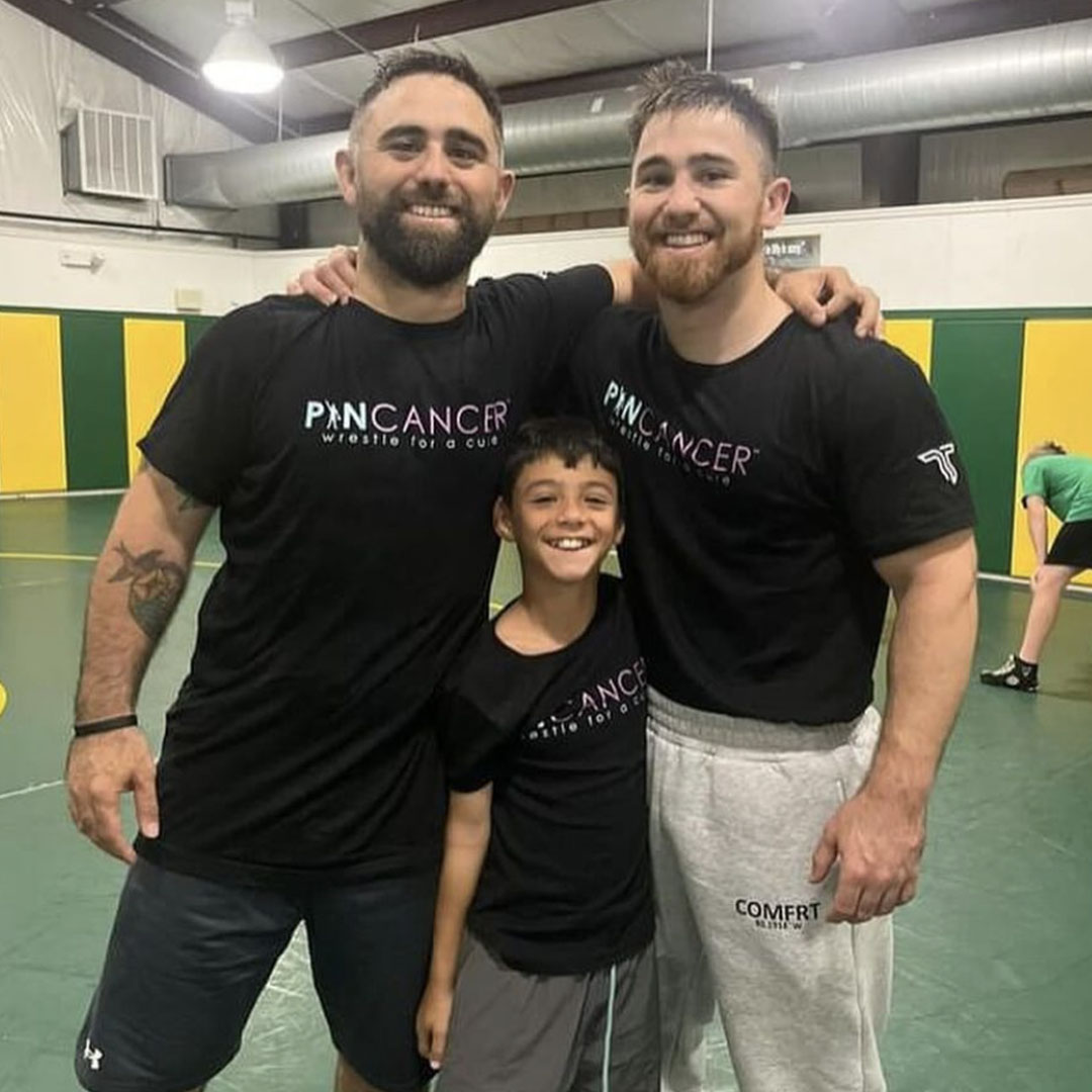 host a wrestling clinic for a cure